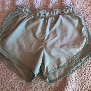 Green Nike athletic shorts